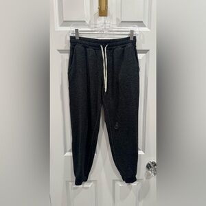 Vuori Women's Performance Joggers in a charcoal heather - flaw